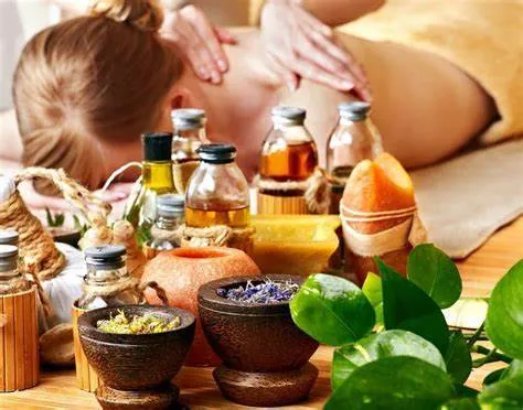 Aromatherapie-Massage mit biologischen Ölen